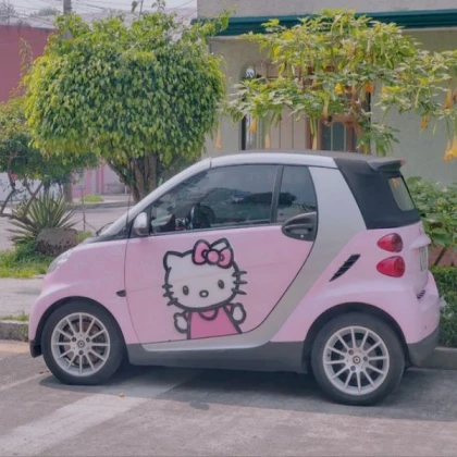 A Mercedes car with a hello Kitty repaint!